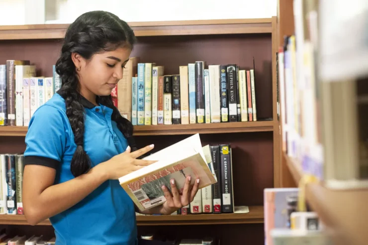 MBS student reading in the school library