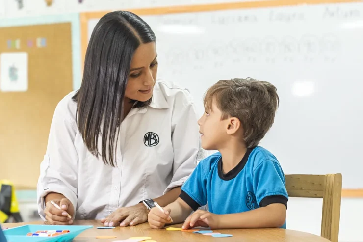 MBS teacher working one-on-one with an early childhood student