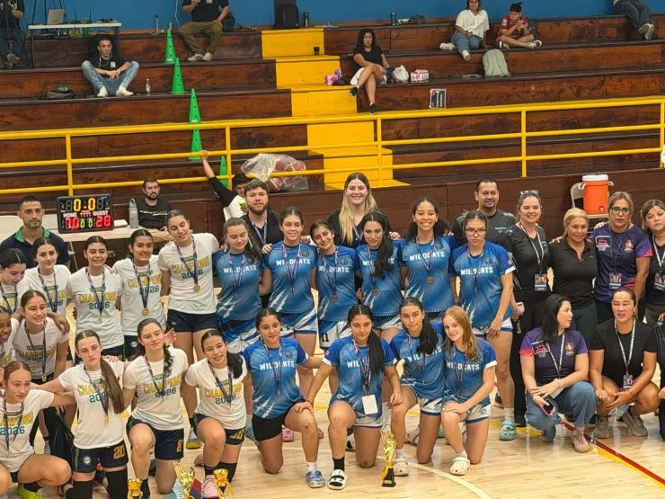 Marian Baker School girls' basketball team with their 3rd place trophy and medals at Juegos Deportivos Estudiantiles 2026
